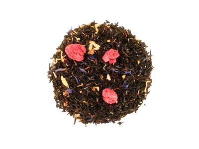 Zoom bild av Ett svart te med tropiska frukter och grädde.